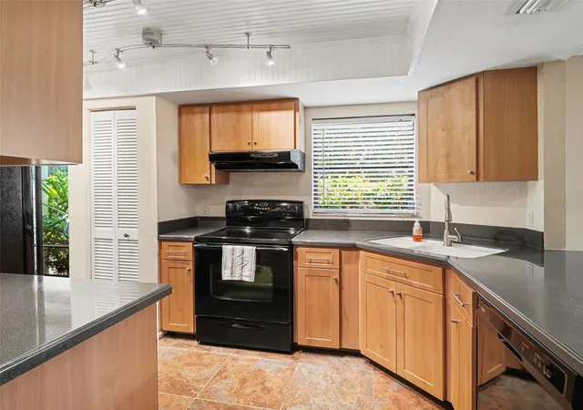 Photo 3 of Condo for sale at 7205 Curtiss Ave #1A, Sarasota, FL 34231 | MLS# A4690836 | Listing updated on 2026-09-16