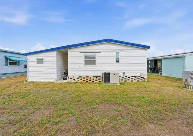 Photo 1 of Manufactured home for sale at 2049 Manoa Dr, Holiday, FL 34691 | MLS# TB8500269 | Listing updated on 2026-09-01