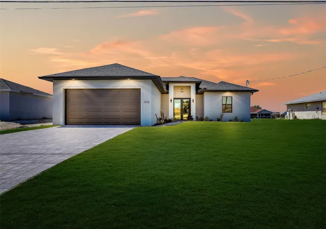 1st image of 1310 Nw 11th Ter, Cape Coral, FL 33993 | MLS# A4690878