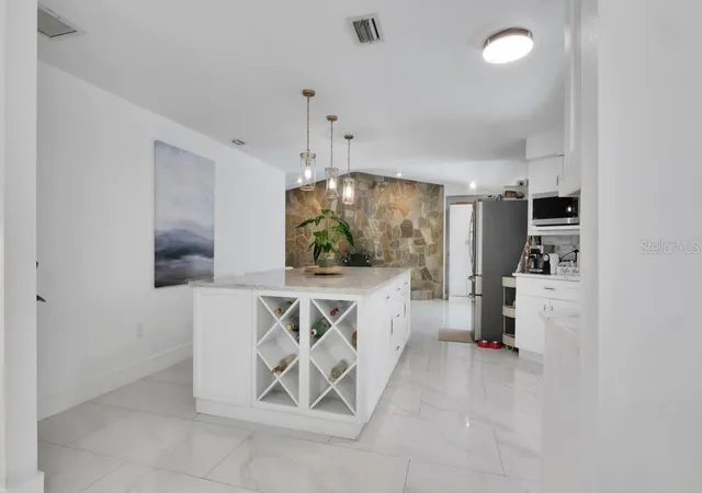 5th image of 1307 Normandy Cir, Palm Harbor, FL 34683 | MLS# TB8500489