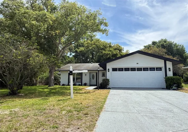 2nd image of 10501 Hardwood Ct, Port Richey, FL 34668 | MLS# TB8500496