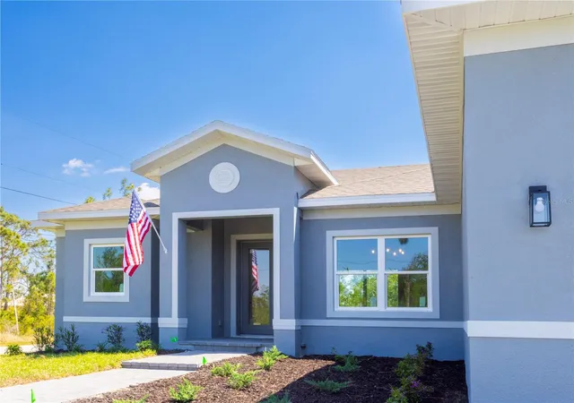 Photo 2 of Single family home for sale at 9443 Hallendale Dr, Port Charlotte, FL 33981 | MLS# O6401334 | Listing updated on 2026-08-28