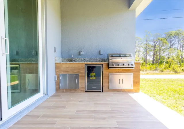 Photo 4 of Single family home for sale at 9443 Hallendale Dr, Port Charlotte, FL 33981 | MLS# O6401334 | Listing updated on 2026-08-28