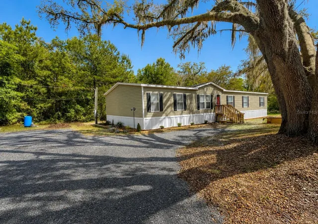1st image of 276 Nw Battle Hill Ln, Lake City, FL 32055 | MLS# O6401427