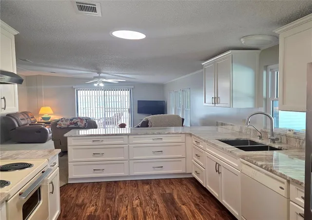 Photo 3 of Manufactured home for sale at 6114 Grand Oaks Dr SE, Winter Haven, FL 33884 | MLS# L4961323 | Listing updated on 2026-09-05