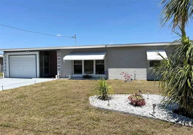 Photo 2 of Single family home for sale at 123 Poinsettia Cir Ne, Port Charlotte, FL 33952 | MLS# C7525256 | Listing updated on 2026-08-20
