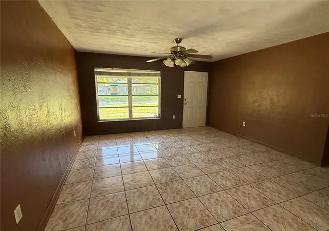 Photo 3 of Single family home for sale at 3802 E Esther St, Orlando, FL 32812 | MLS# O6401779 | Listing updated on 2026-08-28