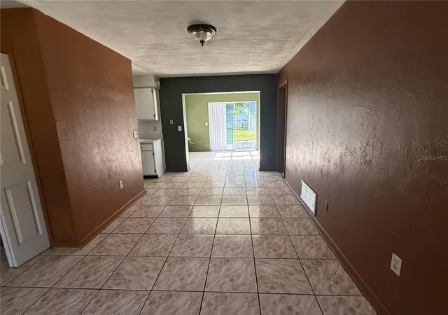 Photo 4 of Single family home for sale at 3802 E Esther St, Orlando, FL 32812 | MLS# O6401779 | Listing updated on 2026-08-28