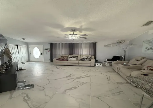 Photo 3 of Single family home for sale at 11435 Pickford St, Spring Hill, FL 34609 | MLS# TB8501137 | Listing updated on 2026-07-30