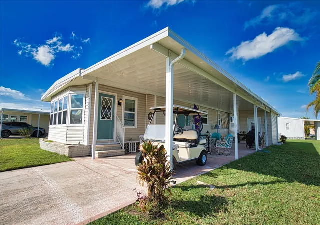 Photo 2 of Manufactured home for sale at 702 Blanca, North Port, FL 34287 | MLS# TB8501209 | Listing updated on 2026-09-22