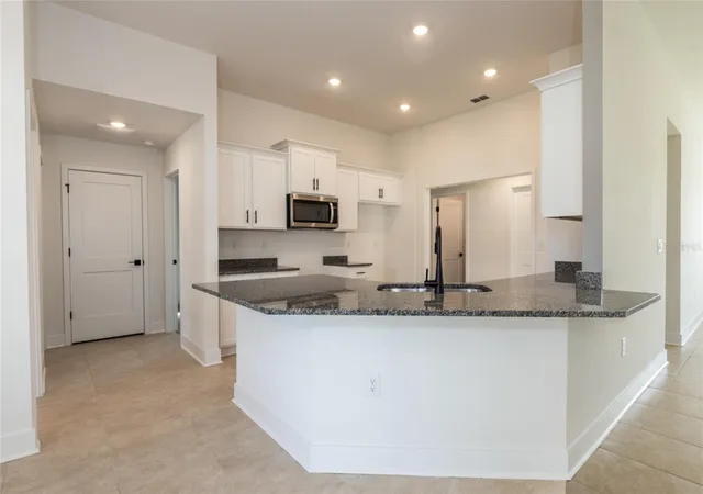 Photo 3 of Single family home for sale at 74 Princeton Ln, Palm Coast, FL 32164 | MLS# FC318035 | Listing updated on 2026-10-26