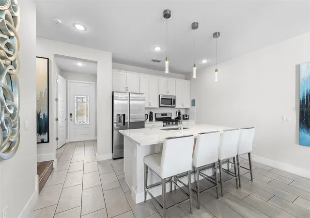 4th image of 856 Driving Range Ct, Reunion, FL 34747 | MLS# O6402090