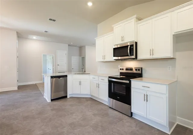 Photo 3 of Single family home for sale at 79 Port Royal Dr, Palm Coast, FL 32164 | MLS# FC318038 | Listing updated on 2026-10-03