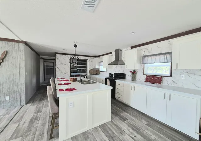 Photo 4 of Manufactured home for sale at 8128 Weeping Willow St, Brooksville, FL 34613 | MLS# TB8501607 | Listing updated on 2026-09-03