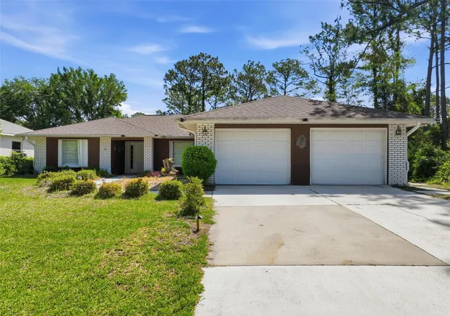1st image of 26 Woodbury Dr, Palm Coast, FL 32164 | MLS# FC318045