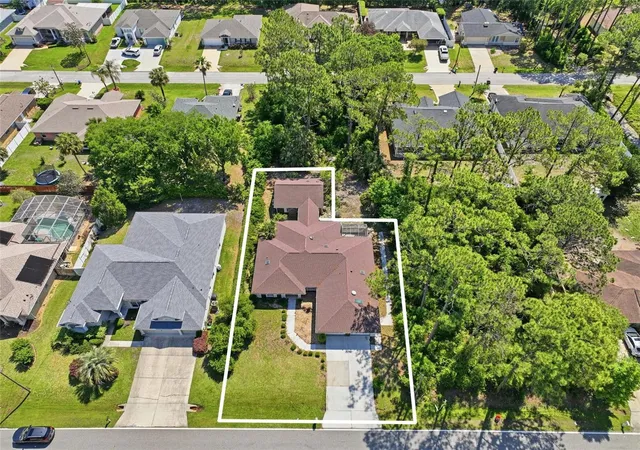 2nd image of 26 Woodbury Dr, Palm Coast, FL 32164 | MLS# FC318045