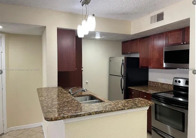 4th image of 5160 Conroy Rd #14, Orlando, FL 32811 | MLS# S5148623