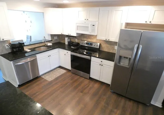 Photo 2 of Townhouse for sale at 2554 Sea Wind Way, Clearwater, FL 33763 | MLS# W7885203 | Listing updated on 2026-08-10