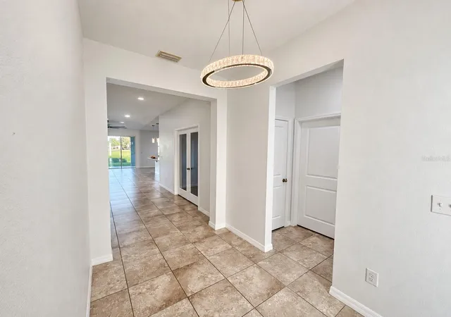 Photo 3 of Single family home for sale at 5703 Sw 50th Avenue, Ocala, FL 34474 | MLS# OM723558 | Listing updated on 2026-09-23