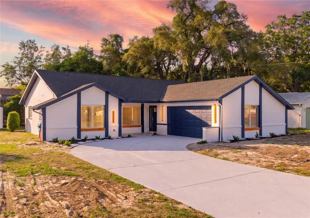 Photo 1 of Single family home for sale at 1215 Waterfall Dr, Spring Hill, FL 34608 | MLS# TB8501932 | Listing updated on 2026-09-22