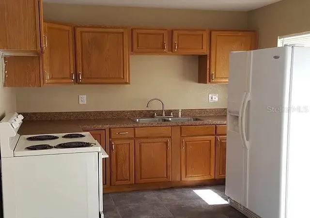 Photo 2 of Single family home for sale at 1235 Morgan Dr, Lakeland, FL 33801 | MLS# TB8501961 | Listing updated on 2026-09-16