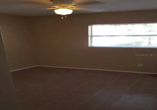 Photo 4 of Single family home for sale at 1235 Morgan Dr, Lakeland, FL 33801 | MLS# TB8501961 | Listing updated on 2026-09-16