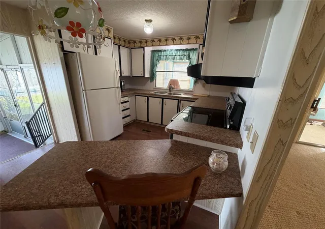 Photo 3 of Manufactured home for sale at 930 Tarrson Blvd, Lady Lake, FL 32159 | MLS# O6402440 | Listing updated on 2026-10-06