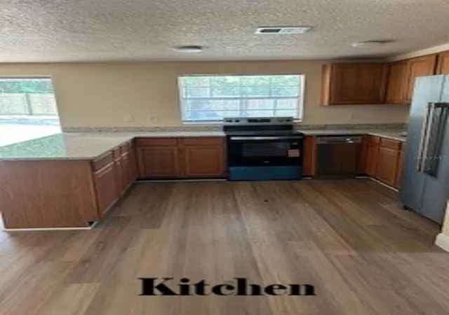 5th image of 26356 Rolling Acres Dr, Brooksville, FL 34602 | MLS# TB8501974