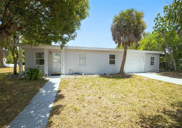 Photo 1 of Single family home for sale at 203 Waterway Cir Ne, Port Charlotte, FL 33952 | MLS# C7525395 | Listing updated on 2026-07-01