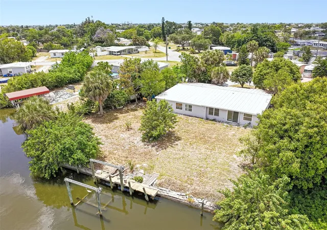 Photo 3 of Single family home for sale at 203 Waterway Cir Ne, Port Charlotte, FL 33952 | MLS# C7525395 | Listing updated on 2026-10-21