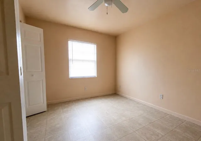 Listing Photo 2 - Condo for sale in building located at 8604 N Br Ave, TAMPA, FL 33604 - Unit #
