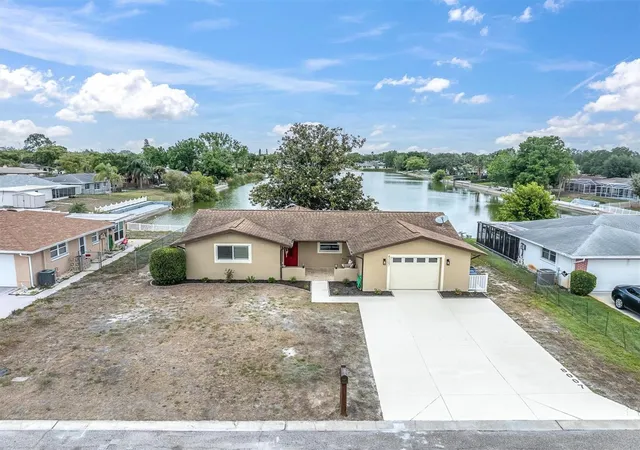 40th image of 8007 Mimosa Dr, Port Richey, FL 34668 | MLS# TB8502070