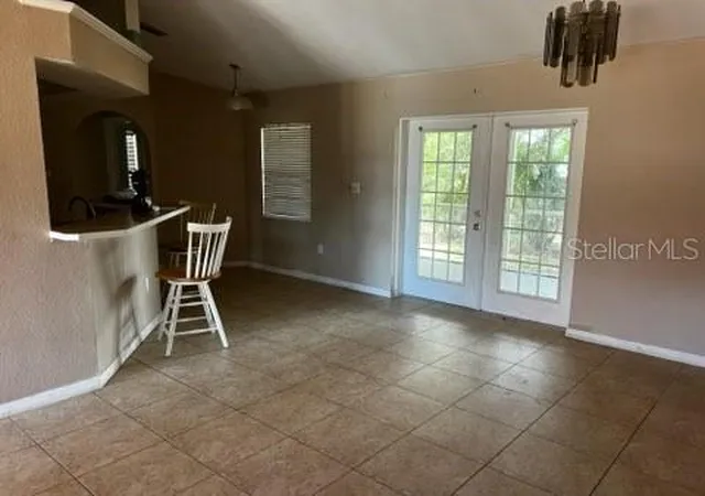 Photo 2 of Single family home for sale at 220 Palmetto Cir Ne, Port Charlotte, FL 33952 | MLS# A4691533 | Listing updated on 2026-09-29