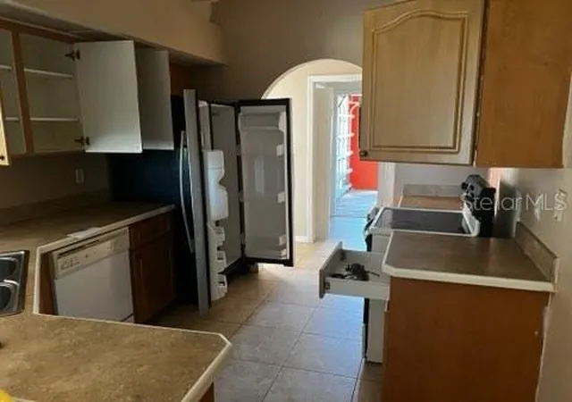 Photo 4 of Single family home for sale at 220 Palmetto Cir NE, Port Charlotte, FL 33952 | MLS# A4691533 | Listing updated on 2026-09-29