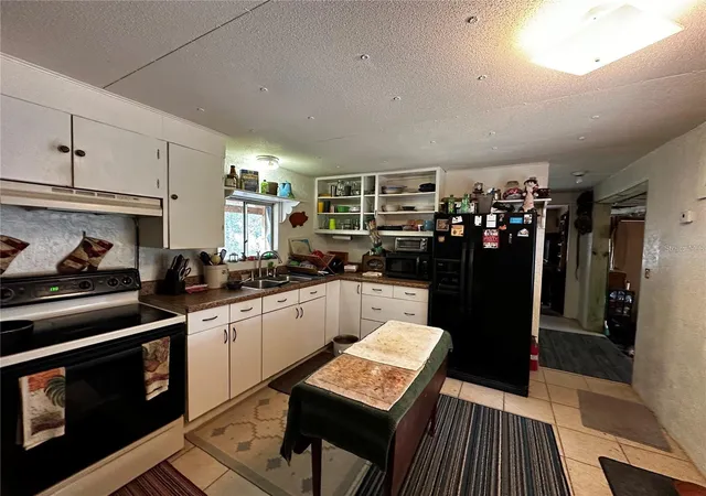 Photo 3 of Manufactured home for sale at 12212 NE 238th Terrace, Fort Mc Coy, FL 32134 | MLS# TB8502272 | Listing updated on 2026-05-01
