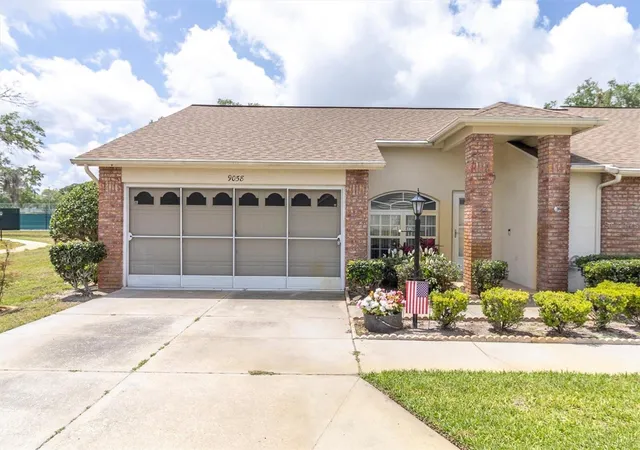Listing Photo 1 - Condo for sale in building located at 9058 Arundle Pl, NEW PORT RICHEY, FL 34655