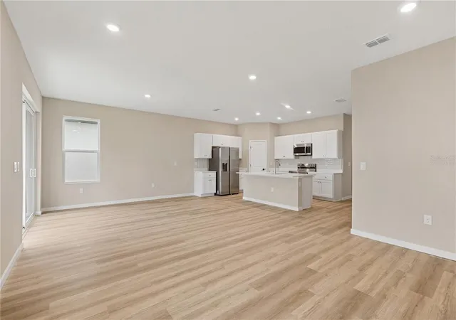 Photo 4 of Single family home for sale at 90 Springwood Dr, Palm Coast, FL 32137 | MLS# FC318096 | Listing updated on 2026-10-25