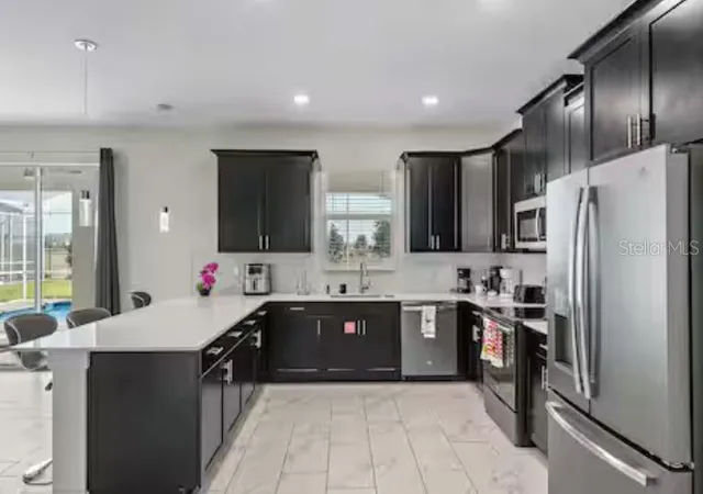 3rd image of 913 Ocean Course Ave, Davenport, FL 33896 | MLS# O6402821