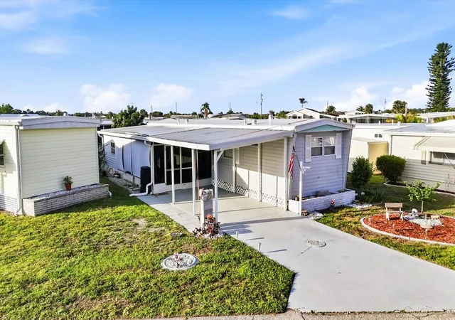 Photo 3 of Manufactured home for sale at 527 Blackburn Blvd, North Port, FL 34287 | MLS# D6147240 | Listing updated on 2026-09-13