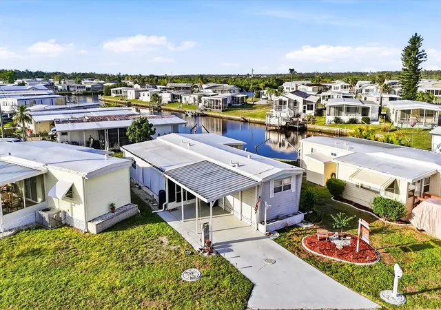 Photo 4 of Manufactured home for sale at 527 Blackburn Blvd, North Port, FL 34287 | MLS# D6147240 | Listing updated on 2026-09-13
