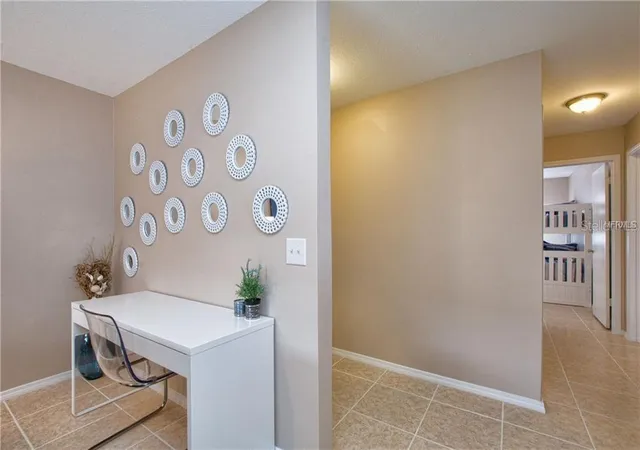 Listing Photo 1 - Condo for sale in building located at 4160 Pershing Pointe Pl, ORLANDO, FL 32822 - Unit #1