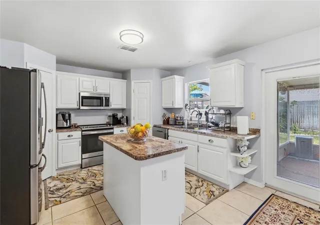 Photo 4 of Single family home for sale at 122 Carmel Bay Dr, Sanford, FL 32771 | MLS# O6402946 | Listing updated on 2026-09-29