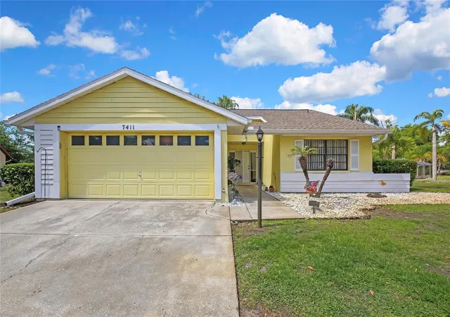 1st image of 7411 Baltusrol Dr, New Port Richey, FL 34654 | MLS# W7885291