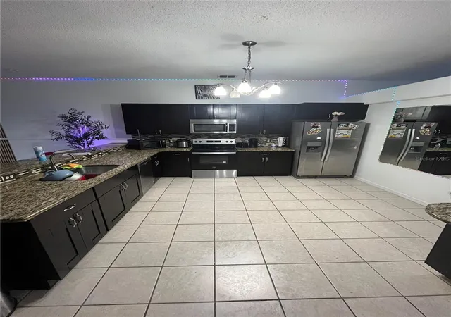 Photo 5 of Single family home for sale at 823 Ognon Ct, Kissimmee, FL 34759 | MLS# S5148867 | Listing updated on 2026-07-06