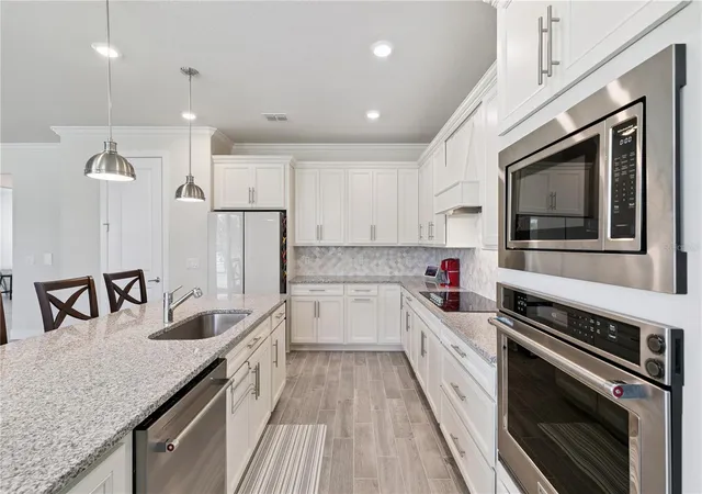 5th image of 1462 Grand Palm Dr, Orlando, FL 32828 | MLS# O6403212