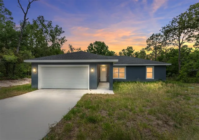 1st image of 10374 Se 126th Ln, Belleview, FL 34420 | MLS# OM723808