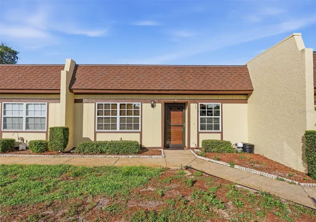 1st image of 11430 Carriage Hill Dr #4, Port Richey, FL 34668 | MLS# W7885329