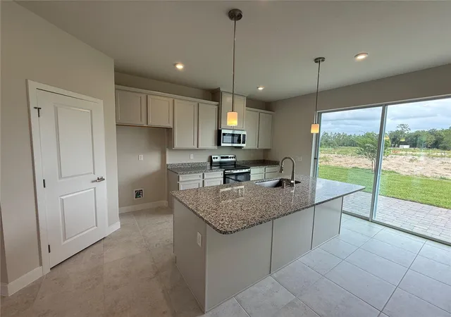 2nd image of 1247 Pineywood Field Dr, Davenport, FL 33837 | MLS# W7885332