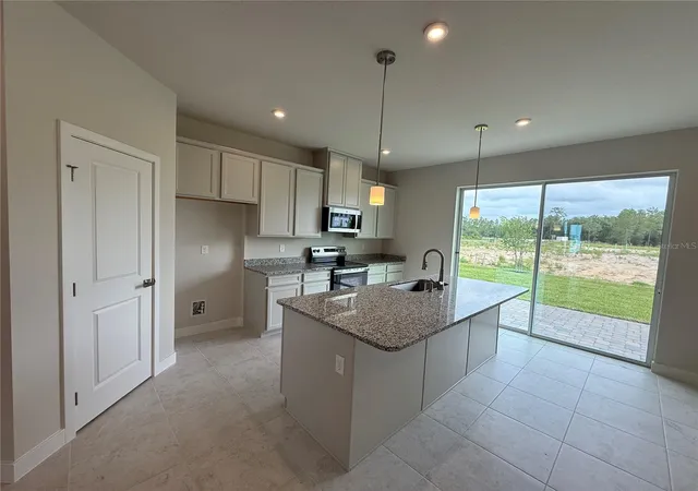 2nd image of 1241 Pineywood Field Dr, Davenport, FL 33837 | MLS# W7885335