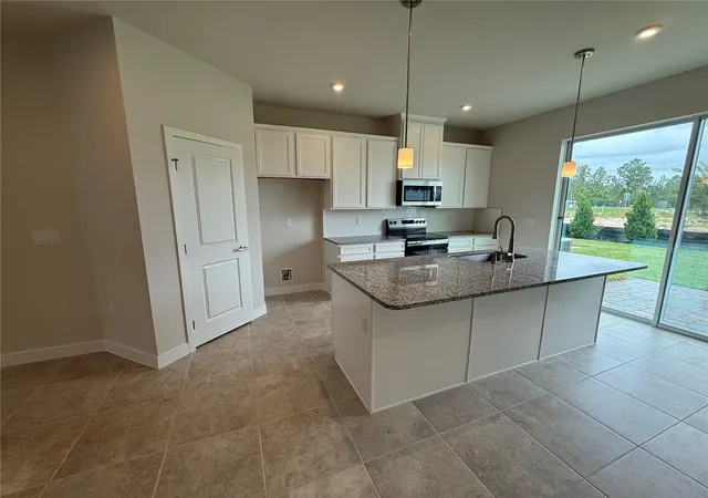 Photo 2 of Sale Pending at 1229 Pineywood Fld Dr, Davenport, FL 33837 | MLS# W7885337 | Listing updated on 2026-08-21